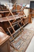 A vintage wooden folding clothes airer