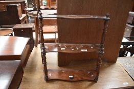 A small Victorian style mahogany waterfall style open wall shelf , width approx. 44cm