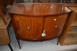 A reproduction Regency cocktail/side cabinet