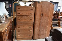 A 1930s limed oak compact bedroom suite comprising , single wardrobe, bed frame, chest of drawers