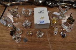 A selection of crystal animal figurines including Swarovski.