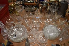 A selection of clear crystal and cut glass items including brandy wine sundae and condiment etc