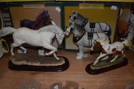 Four horse figures by the Leonardo collection all being boxed