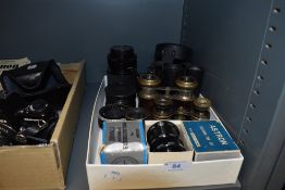 Three pairs of Opera glasses and binoculars, two extention tubes, a Tokina 70-210mm lens a