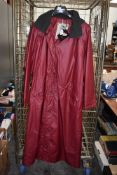 A ladies waterproof jacket, new with tags, longer length, size L.