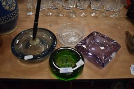 Four ash trays or trinket dishes including moulded, Art Deco pink cut and control bubble pen holder
