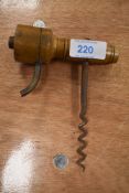 A vintage wooden barrel tap.