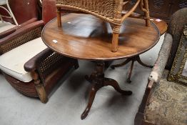 A Victorian mahogany pedestal table having circular top on turned column on triple splay legs,