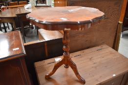 A reproduction Continental style occasional table
