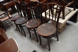 Four traditional bentwood chairs