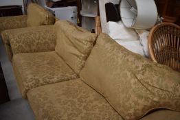 A modern lounge suite in the classical style comprising settee and chair