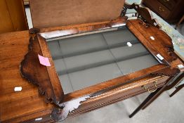 A 19th Century Chippendale revival mirror having mahogany frame