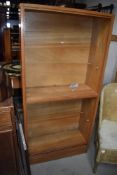 A set of vintage light bookshelves
