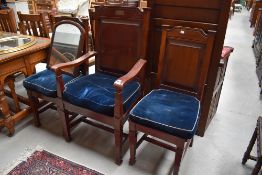 An early 20th Century dark stained set of three church chairs, from Lancashire Baptist church,