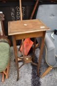 An early 20th Century mahogany plant stand