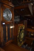 An early 20th Century oak cased wall clock (selling for St Johns Hospice, Lancaster)