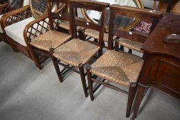 A set of six traditional rush seated chapel chairs