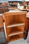 A yellow pine corner wall shelf