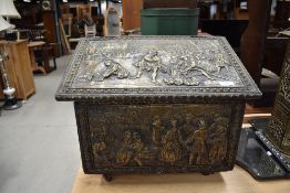 A brass embossed slipper box