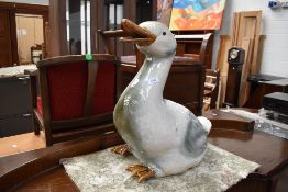 A large ceramic duck figure, height approx. 50cm