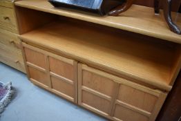 A light teak Nathan entertainment or low side cabinet, width approx. 102cm