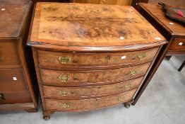 A late 19th or early 20th Century reproduction walnut bow front chest, of nice proportions, width