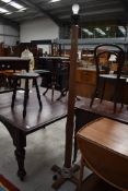 An Arts and Crafts golden oak standard lamp