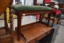 A traditional piano/organ duet stool