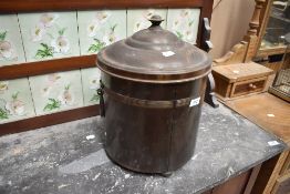 A mid 20th Century brass coal bucket