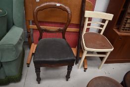 A Victorian mahogany balloon back chair and a vintage kitchen chair