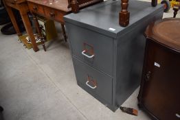A vintage two drawer filing cabinet