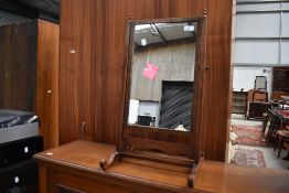 A 19th Century mahogany toilet mirror having shaped base, height approx. 61cm