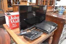 Two Televisions and a freesat box