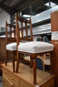 AS pair of late Victorian oak dining chairs , Arts and Crafts/Art Nouveau transitional design