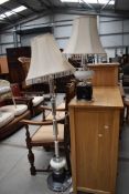Two art deco styled mid century lamps in chrome and enamel