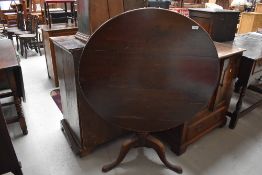 A 19th Century tilt top dining table, diameter approx 89cm