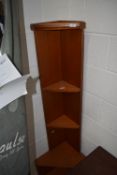 A vintage teak effect corner unit