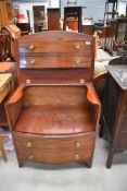 A 19th Century mahogany bow front commode chest of bow front design , faux drawer fronts with