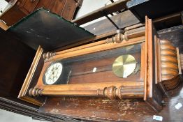 A 19th Century stained frame Vienna style wall clock