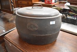 A cast cooking pot, marked Clark & Co, 4 gallons, with lid (selling for St Johns Hospice,