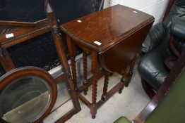 An early 20th Century oak occasional gateleg table