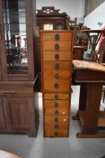 A pair of early 20th Century bedside or similar drawers, will stack to make large narrow set if