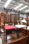 A pair of unusual hall way high backed chairs on turned oak frames