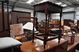 An early 20th Century oak barley twist frame occasional table (selling for St Johns Hospice,