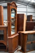 A reproduction corner display, Rossmore or similar, orginal price £650