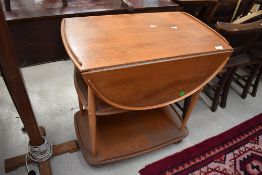 An Ercol light/mid colour tea trolley