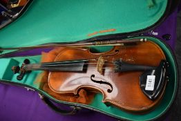 A traditional violin, bow stamped Artist, with hard case