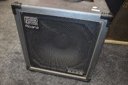 A Roland super cube 100 bass amp