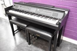 A Yamaha Clavinova CVP-605 digital piano, with two stools (selling for St Johns Hospice, Lancaster)