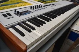 An Arturia Key Lab 88 DAW hammer action midi controller keyboard